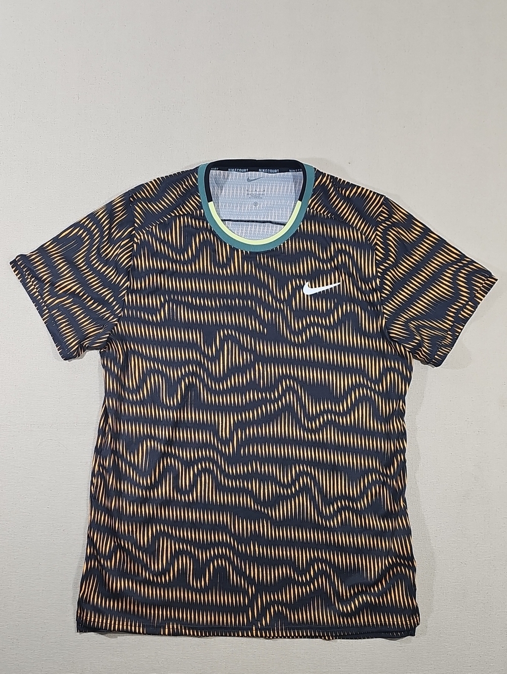 Nike Men’s Black and Orange Wave-Pattern Training Tee with Mint Trim